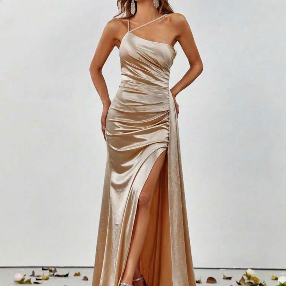 Asymmetrical neck, ruched gold satin formal dress. Good for wedding or prom.